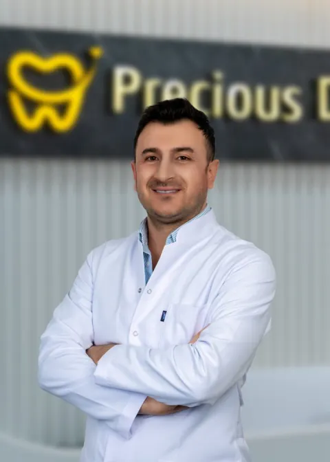 Dt. Hüseyin Yavuz Özbek, Implant surgery and prosthetics at Precious Dental